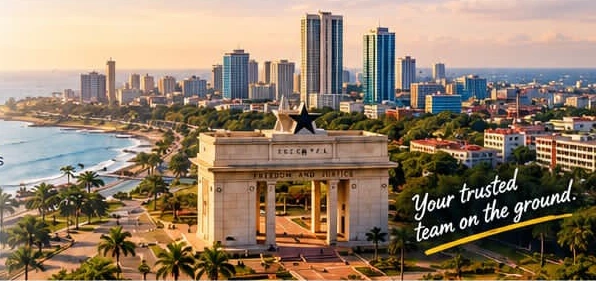 Accra coastline and Independence Arch at sunset